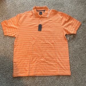 Men’s Arrow short sleeve polo shirt.  Size X-Large. New with tags